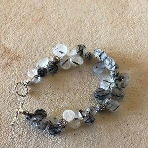Genuine tourmalinated quartz bracelet.